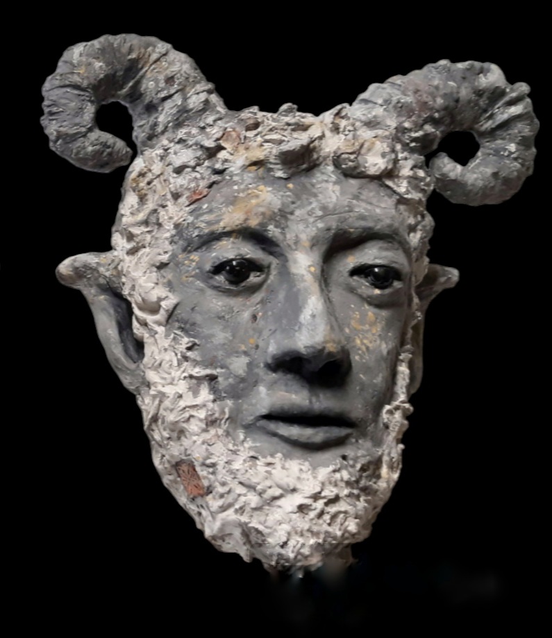 Sculpture visage Dieu pan